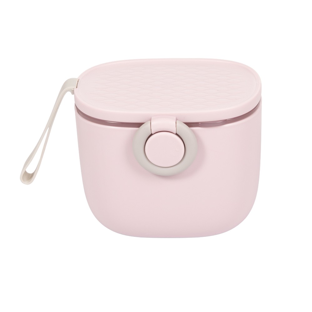Caja compacta rosa para preparar biberones fuera de casa, incluye cuchara dosificadora, disponible en Mimú