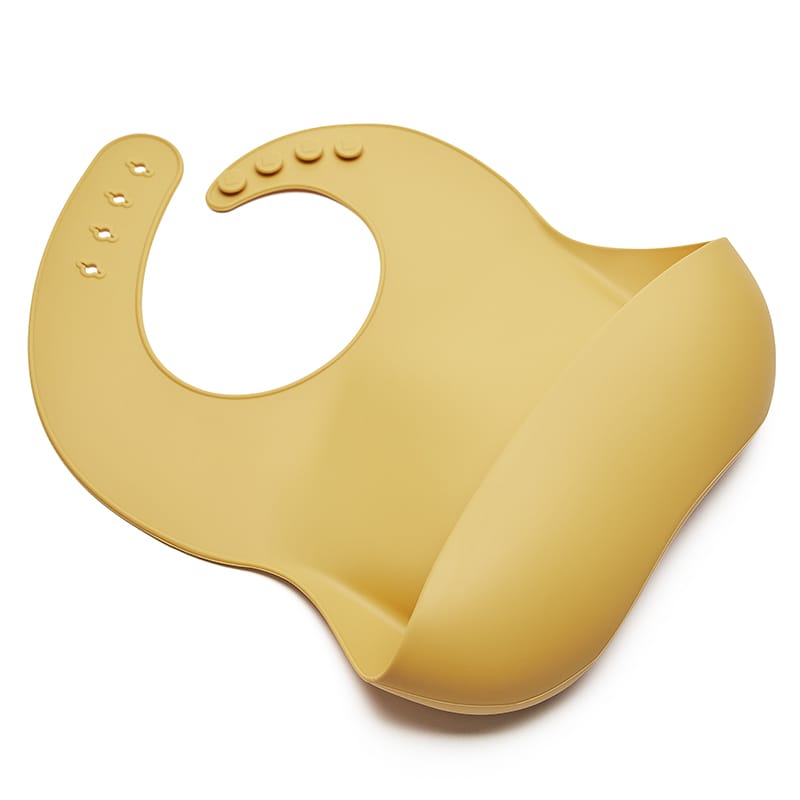 Babero infantil mango, ajustable, ideal BLW y motricidad, práctico y lavable. Mimú bebés