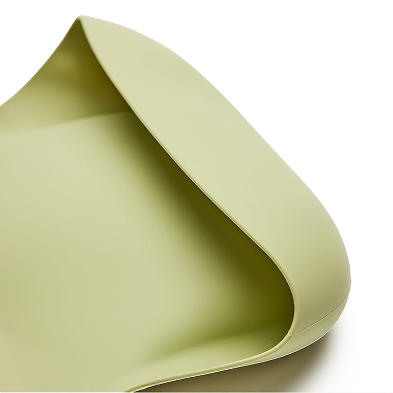 Babero BLW verde atrapa migas, motricidad y menos suciedad. Mimú