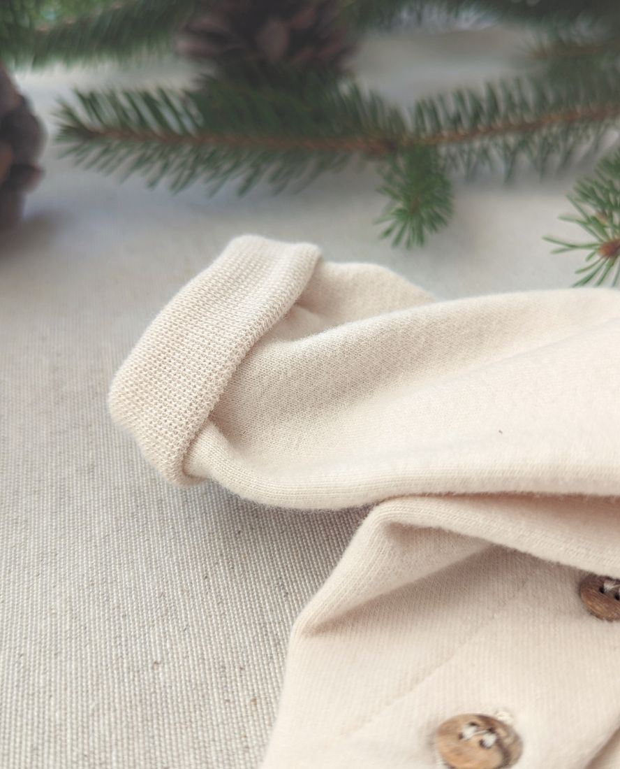 Mono North Baby crudo, suavidad total para bebé. Mimú bebés