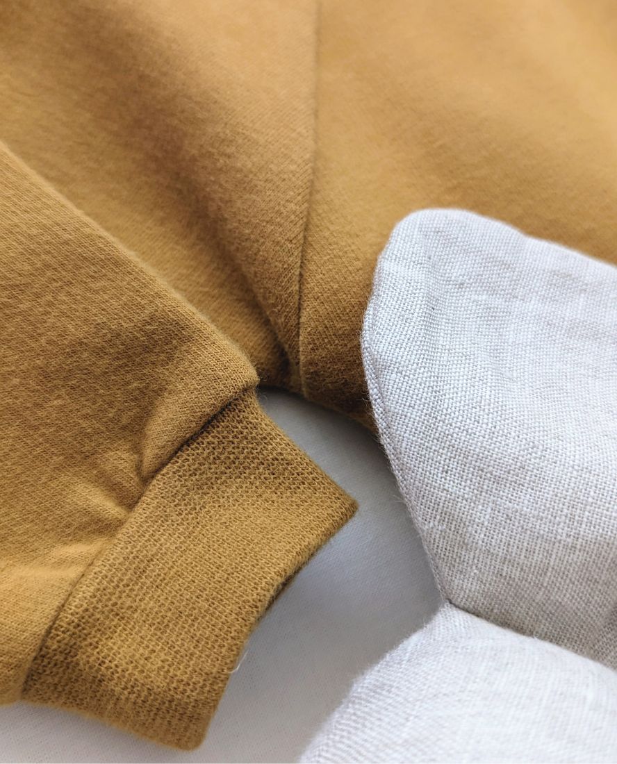 Mono bebé curry, sin pies, ideal combinar con patucos o calzado respetuoso, calidad premium. Mimú bebés Jerez