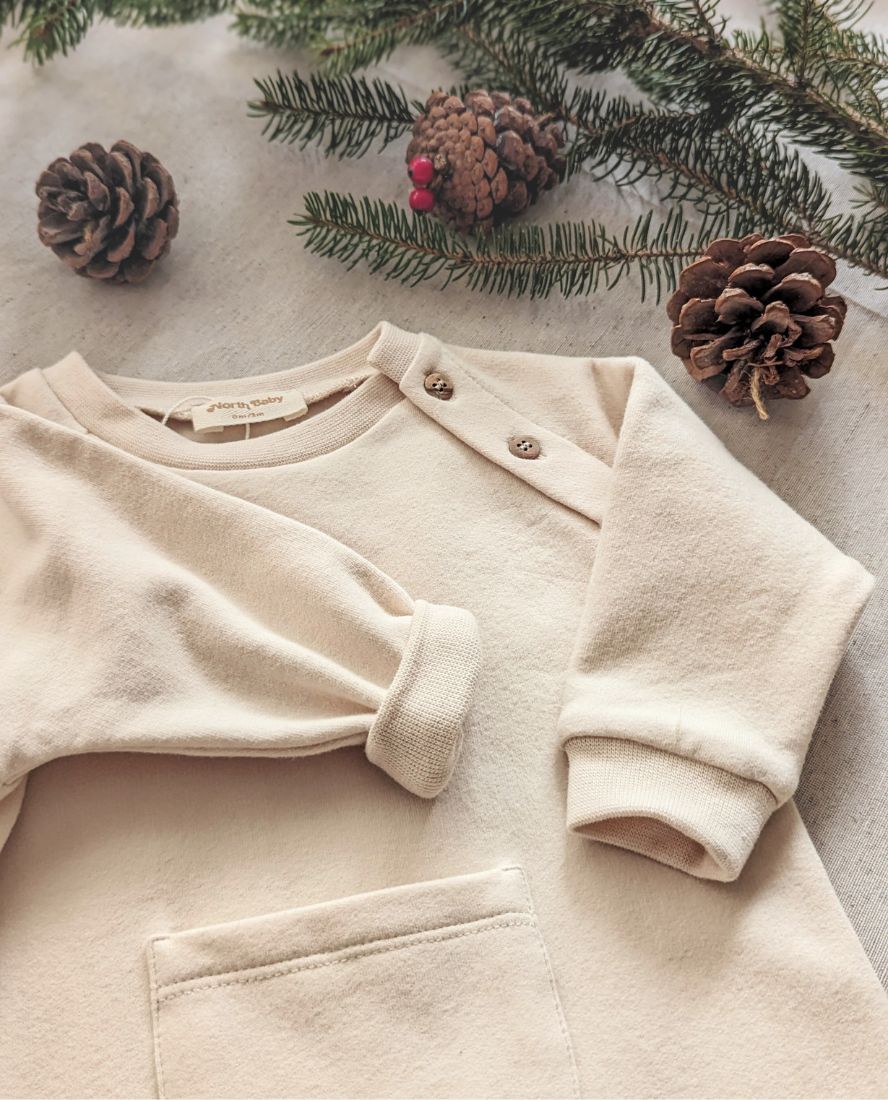 Mono orgánico crudo, protección natural y look neutro, calidad premium. Mimú bebés Jerez