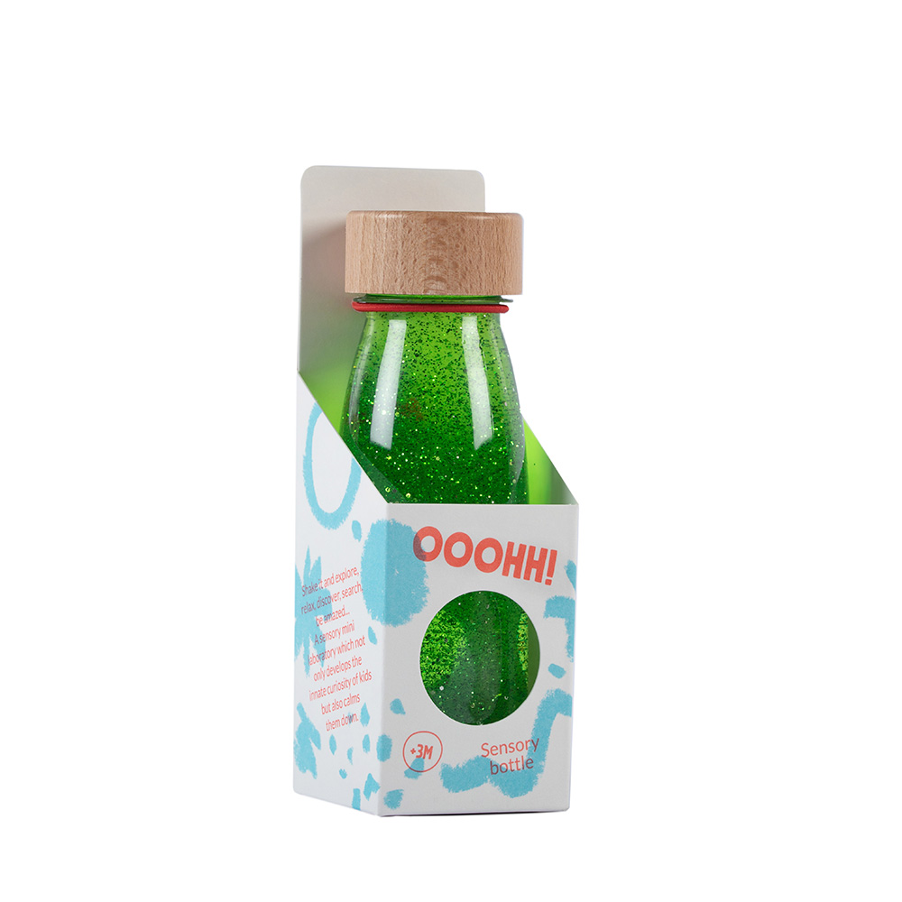 Botella sensorial float color verde, con purpurina, líquido y elementos flotantes, ideal para relajación y concentración en bebés. Peti Boum en Mimú Jerez