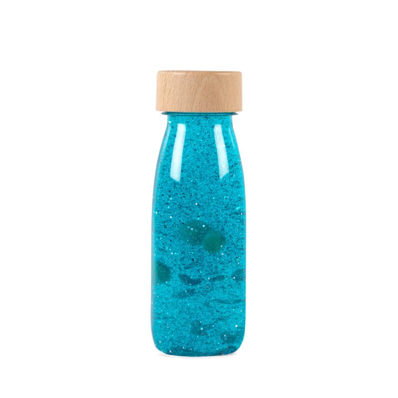 Botella sensorial float color azul, con purpurina, líquido y elementos flotantes, ideal para relajación y concentración en bebés. Mimú Jerez