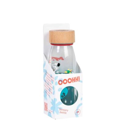 Botella sensorial move espacio y astronauta, con purpurina y piezas flotantes que simulan el cosmos, estimulación visual sin pantallas. Petit Boum en Mimú Jerez